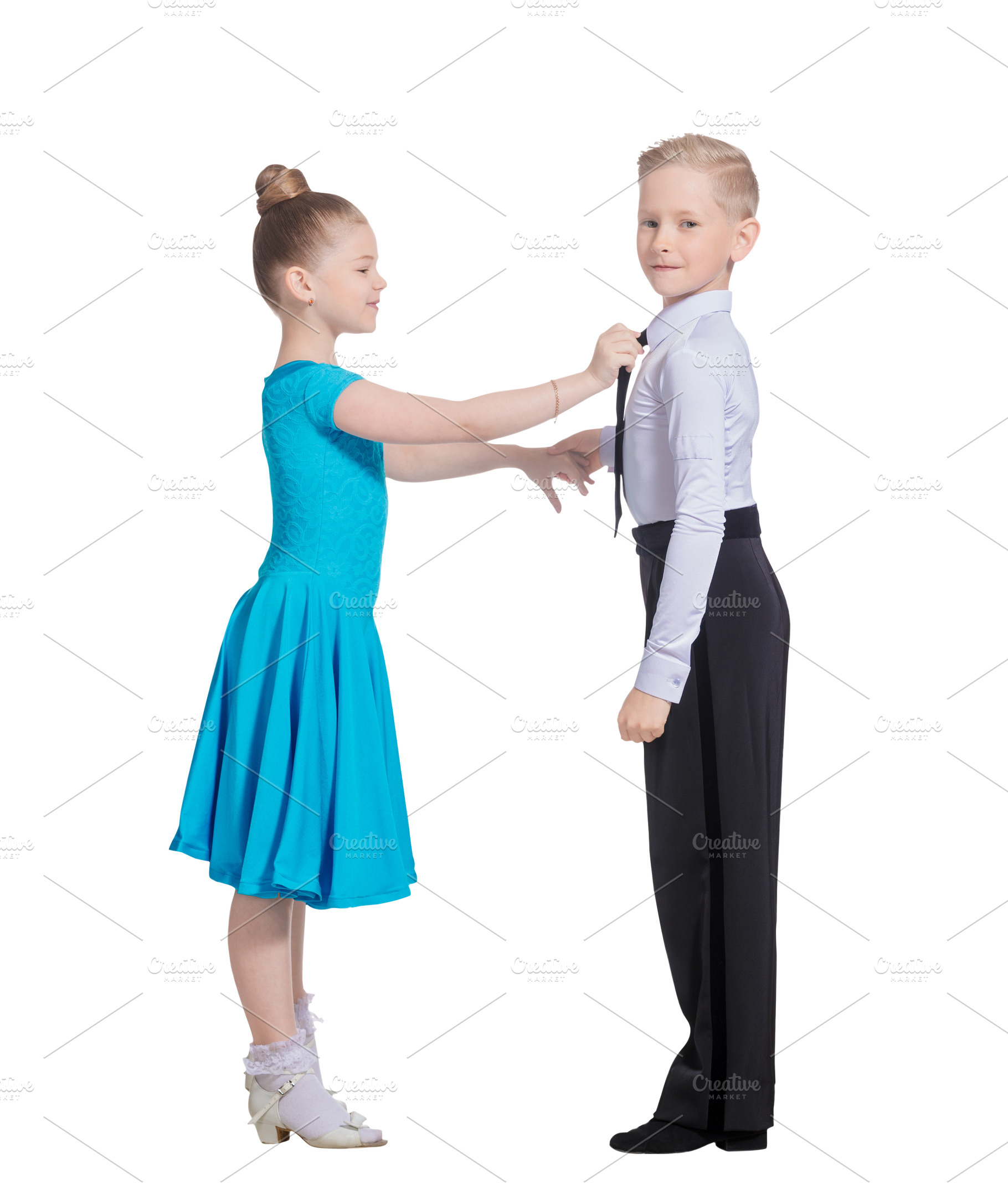 Sports ballroom dancing. Couple of kids, boy and girl  on isolat, a Person Photo by oleghz