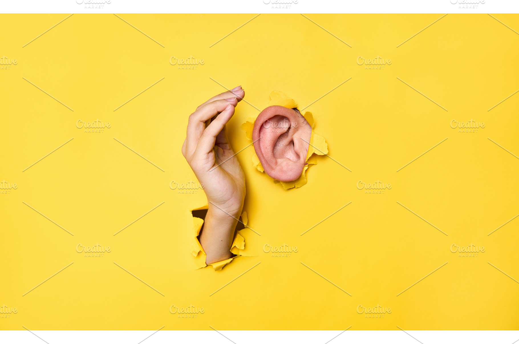 Close-up of human ear and hand, a Background Photo by Gladkov photography