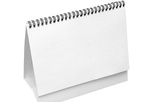 Blank paper desk calendar isolated, a Business Photo by BOOCYS