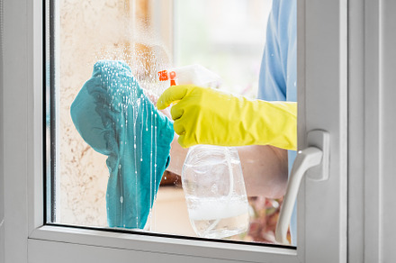 Man doing chores cleaning window, a Person Photo by Andriana Syvanych