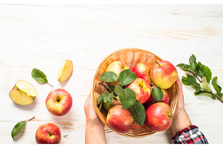 Fresh ripe red apples in the basket, a Food & Drink Photo by Nadia-nb