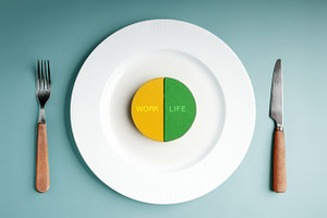 White plate divides WORK and LIFE into two colored halves, symbo, a Photo by salmon.black