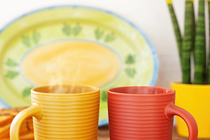 Steaming mugs inviting to a cozy and healthy breakfast, a Food & Drink Photo by Antonio Gravante Market