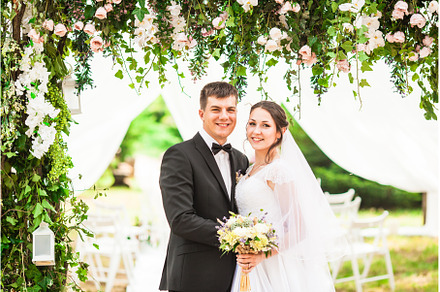 Wedding couple under the flower arch, a Person Photo by oksix
