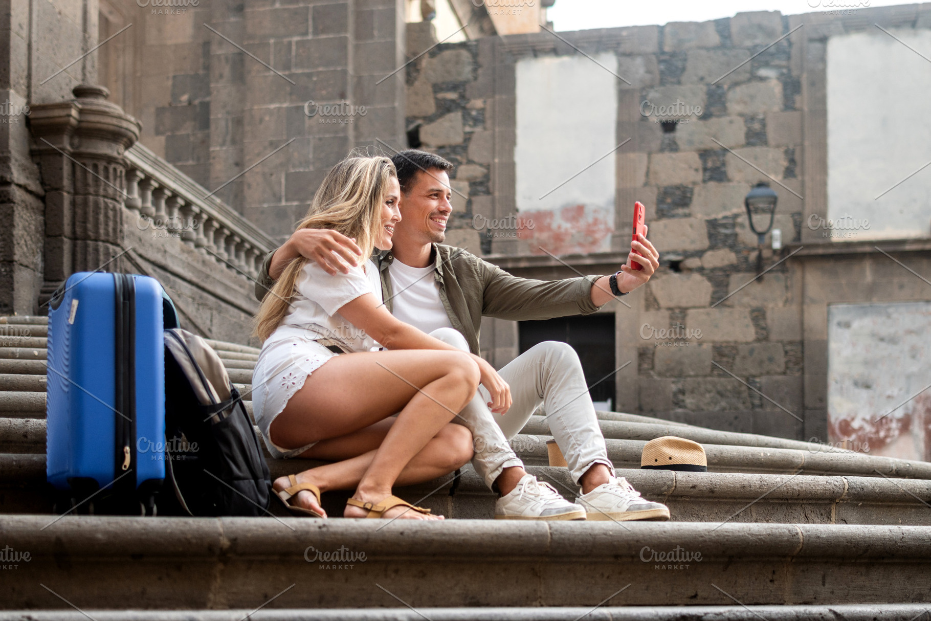 Tourist couple taking a selfie, a Person Photo by etorres69