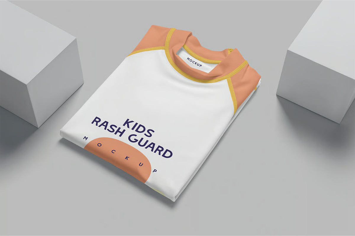 Kids Rash Guard Mockups, a Shirt Mockup by megostudi0 (Photo 4 of 7)