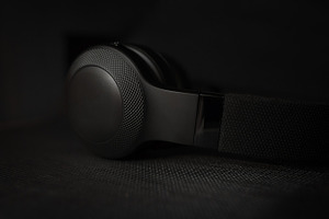 Black headphones in dark