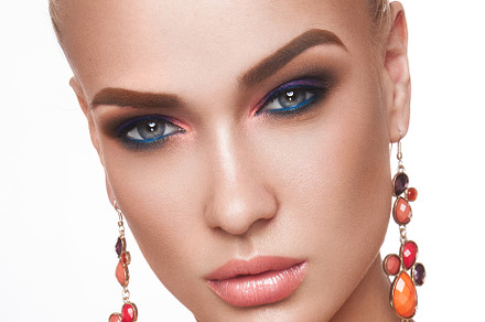 Beautiful woman with colored makeup stock photo containing model and fashion, a Beauty & Fashion Photo by korabkova