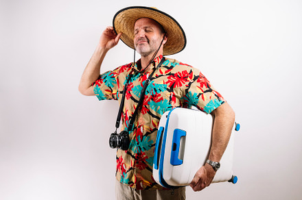 Smiling man ready for tropical vacation adventure