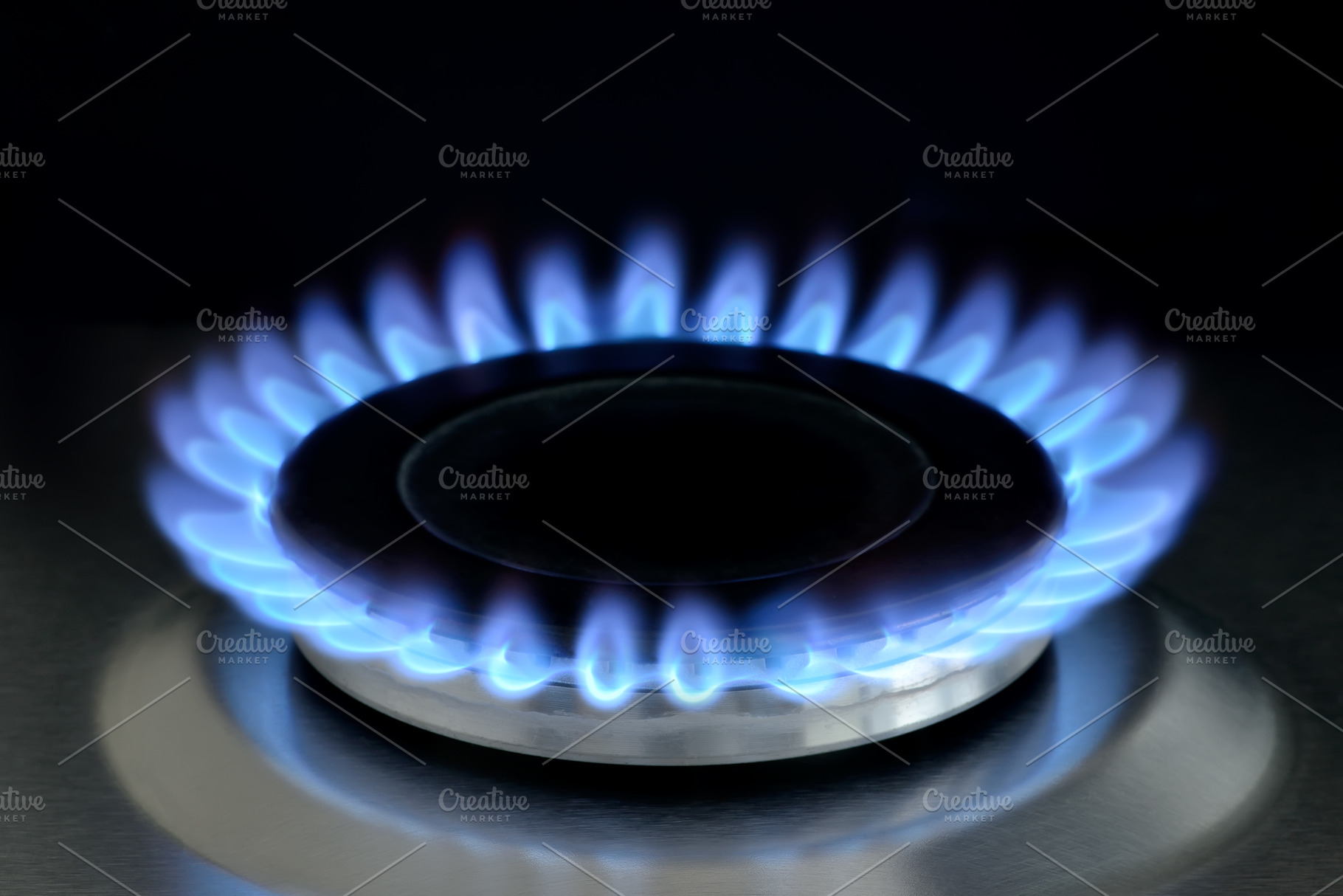 Natural gas burning on gas stove featuring natural gas, flame, and fire, an Industrial Photo by FedotovAnatoly