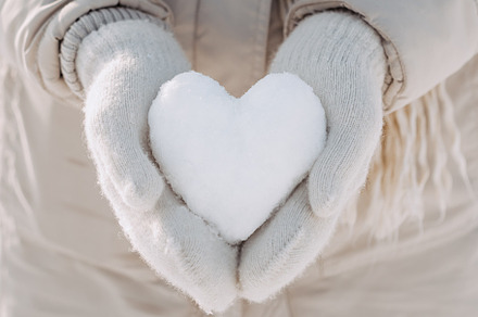 Snow heart in hands stock photo containing snowball and heart, a Holiday Photo by Emotion photo