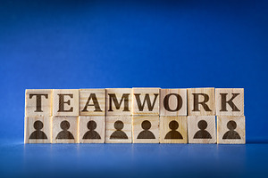 Teamwork Concept with Wooden Blocks and Icons, a Business Photo by Davizro's Market