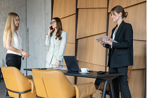 Three women conducting informal, a Business Photo by undrey