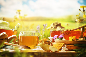 Infusions with natural products on wooden table in nature, a Food & Drink Photo by Davizro's Market