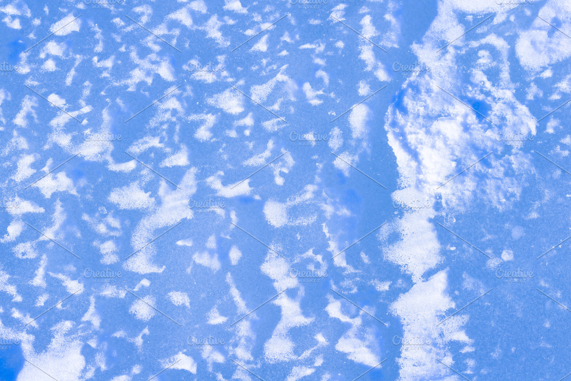 Natural blue ice with snow, rough frozen winter surface, a Photo by MDBildes