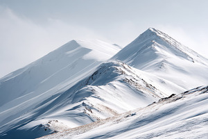 Majestic snow-covered mountains under a blue sky, a Nature Photo by AlyaAnd