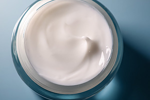 Skincare solution in jar, white face cream for beauty and hygiene routine, pers, a Photo by Studio ANNA