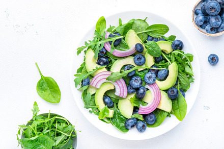 Gourmet vegan salad with blueberry, avocado, red onion, spinach,, a Food & Drink Photo by 5PH