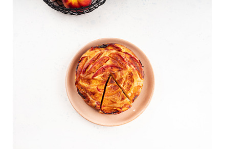 Vegan nectarine peach cake on white