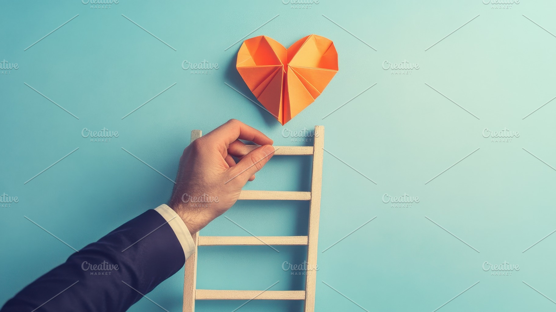 Reaching for the heart on a ladder, a Photo by Beautiful things