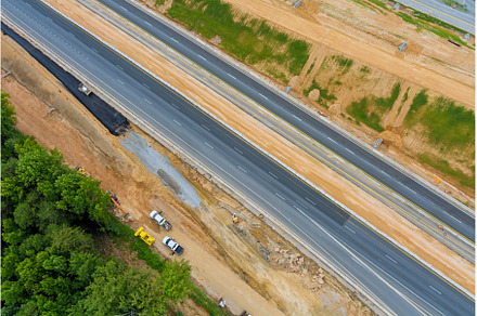 Aerial view under renovation road, an Industrial Photo by Ungvar Studio