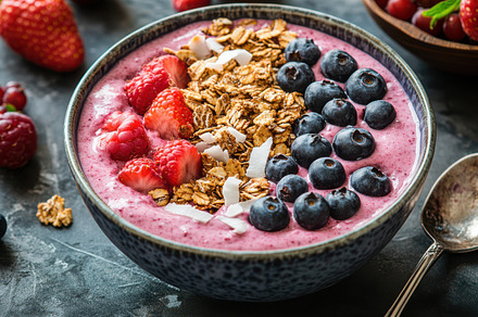 Berry smoothie bowl topped with gran, a Background Photo by Pixeness