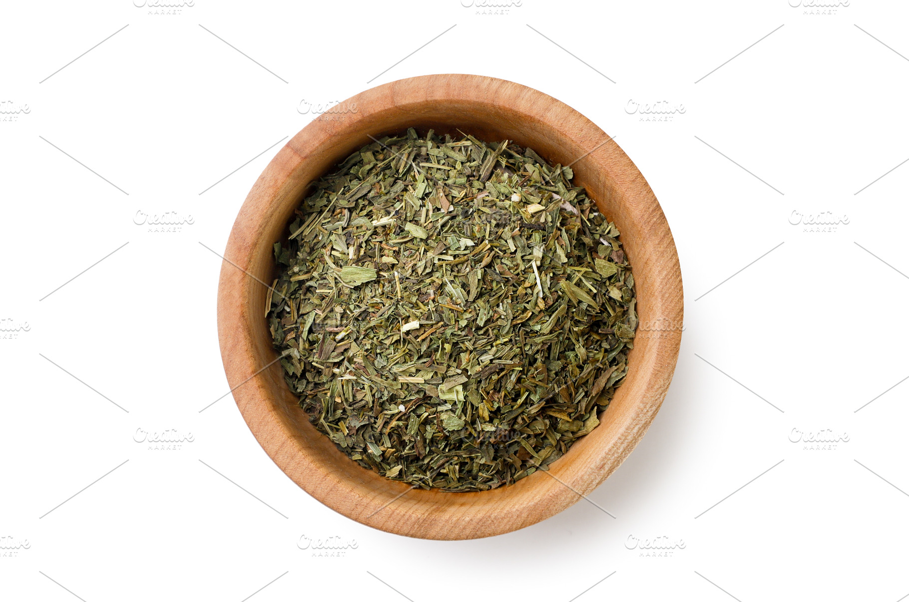 Dried tarragon in a wooden plate on, a Food & Drink Photo by innakreativ