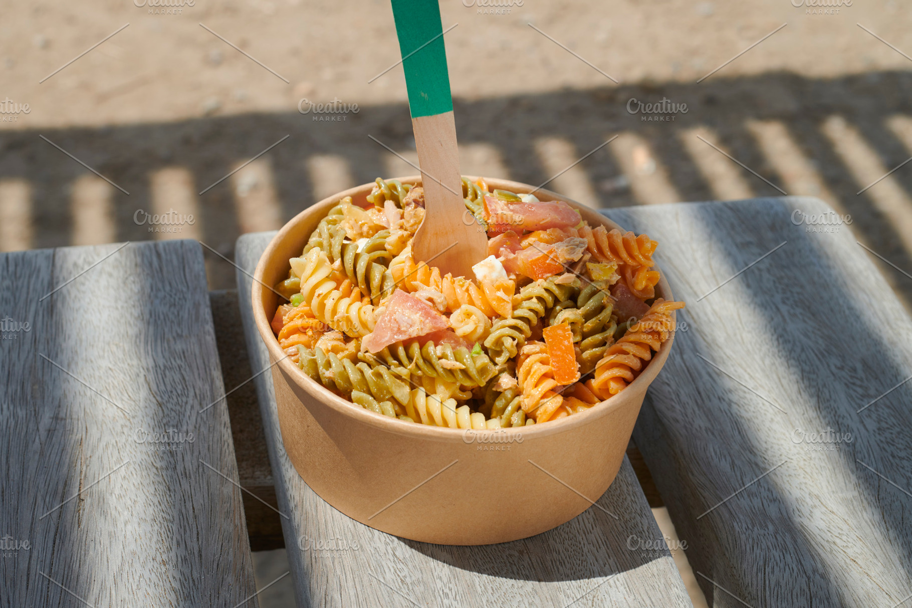 spiral pasta under pergola shade, a Photo by Nito