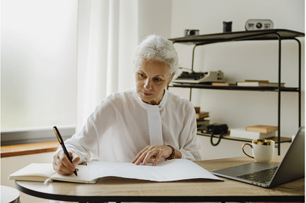 Stylish gray haired mature business