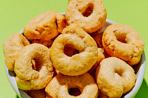 closeup of fennel taralli in a white bowl, a Photo by Nito