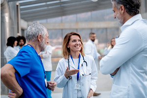 Group of doctors talking during, a Graphic by HalfPoint
