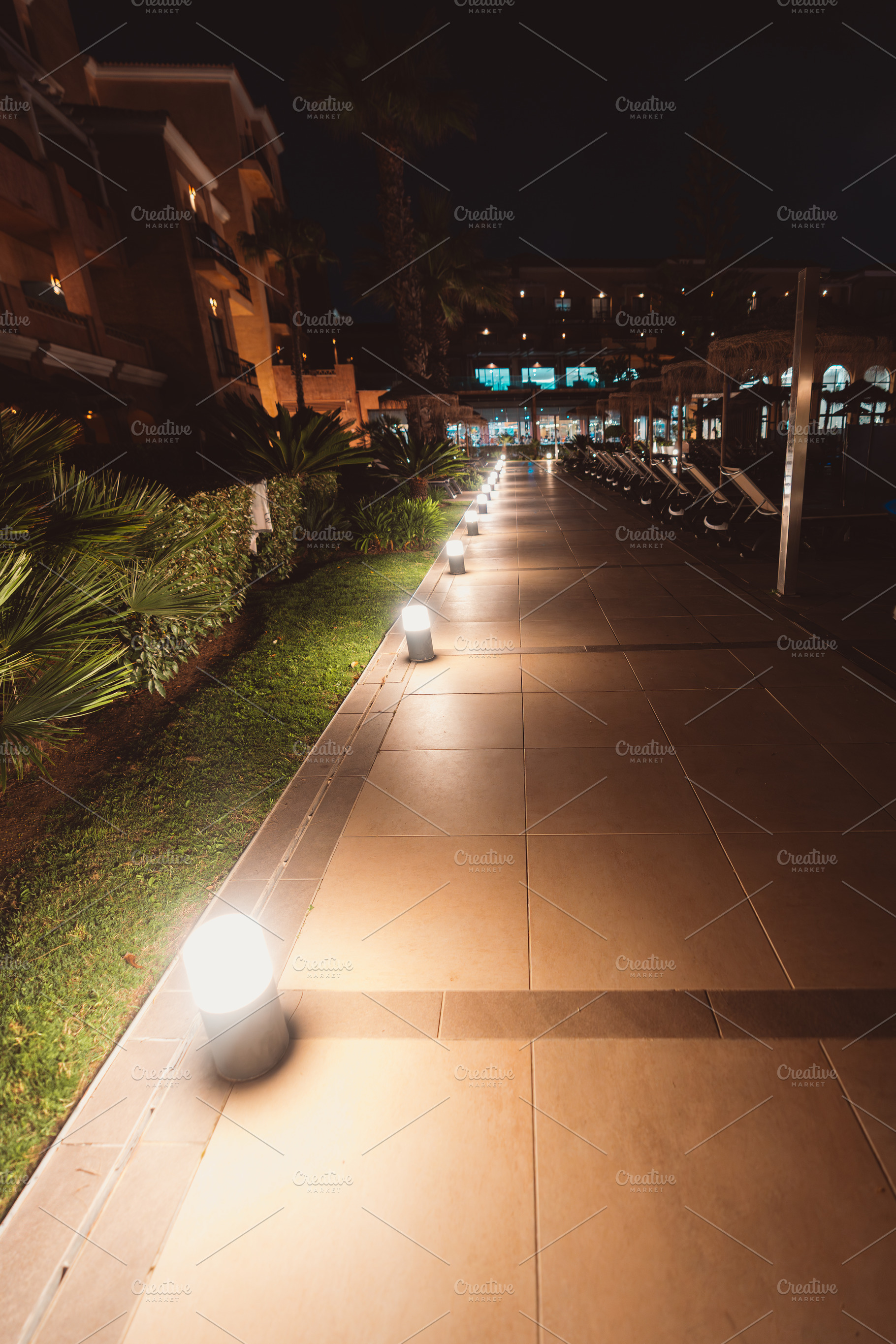 Resort walkway with night lights, an Architecture Photo by SkyNext