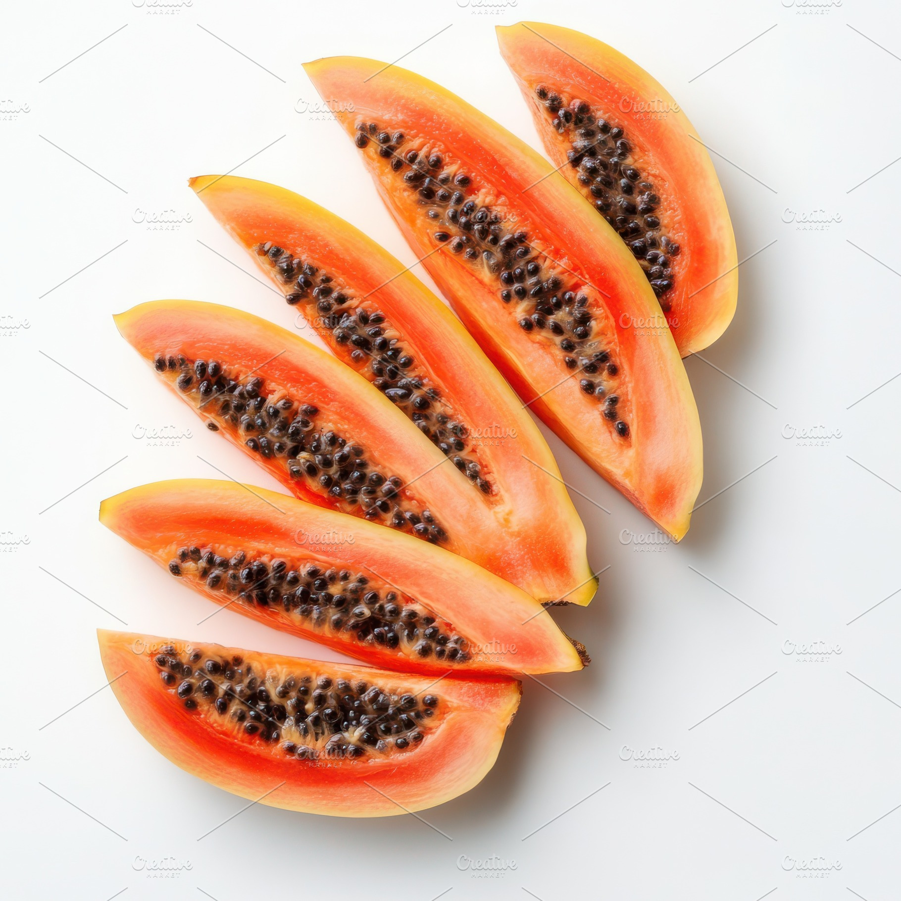 Sliced fresh papaya fruits isolated, a Food & Drink Photo by Pixeness Studio