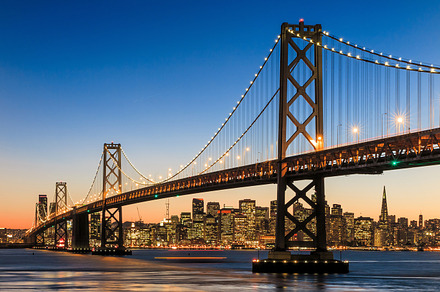 San francisco skyline sunset stock photo containing luminous and light trails, an Architecture Photo by f11photo