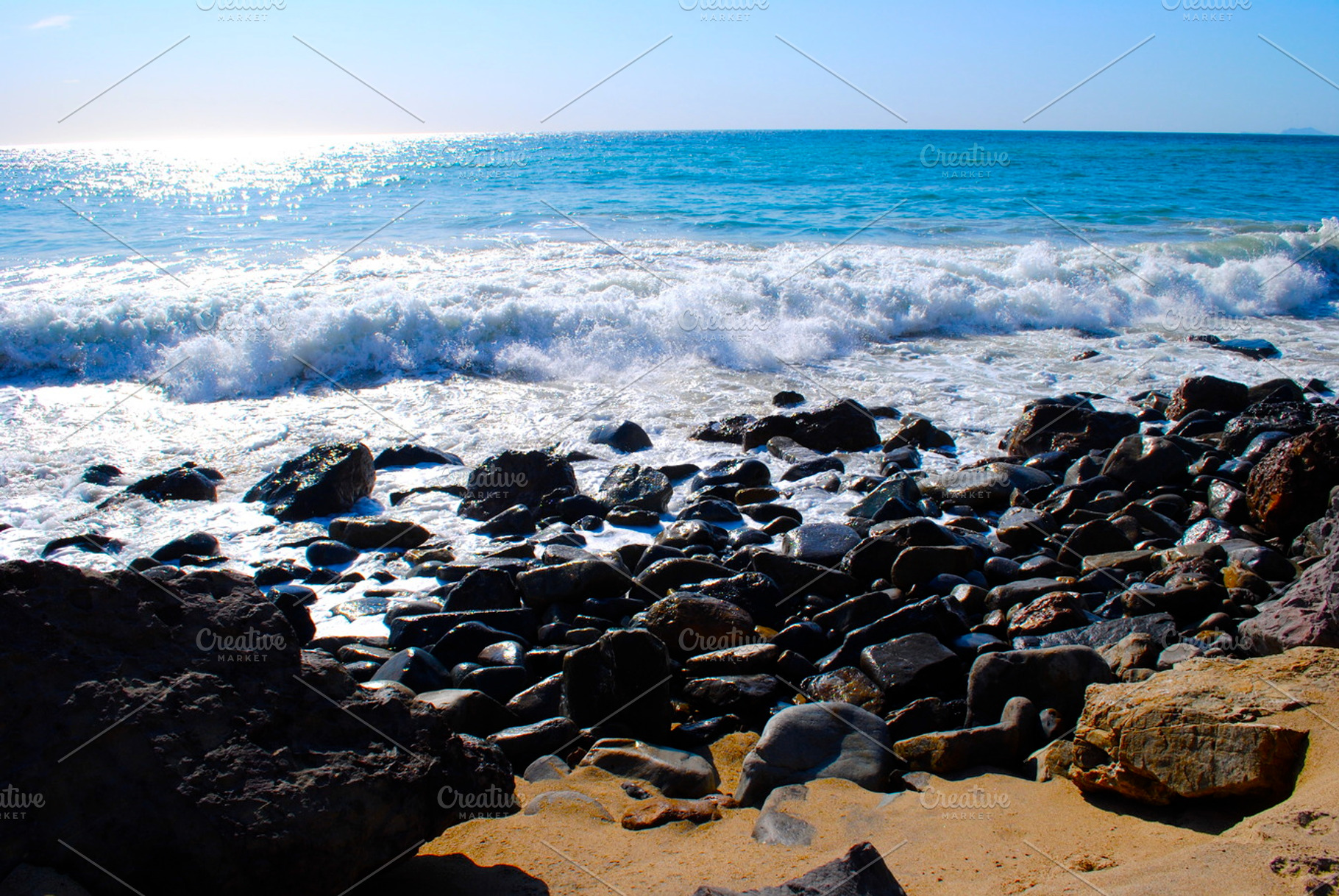 Ocean blue featuring ocean, blue, and rocks, a Nature Photo by aaprostudios