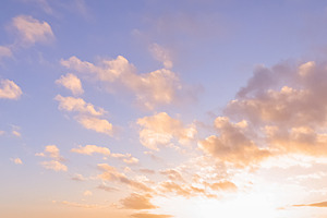 Golden hour sky presenting soft pastel clouds during sunset capturing beauty of, a Photo by Studio ANNA