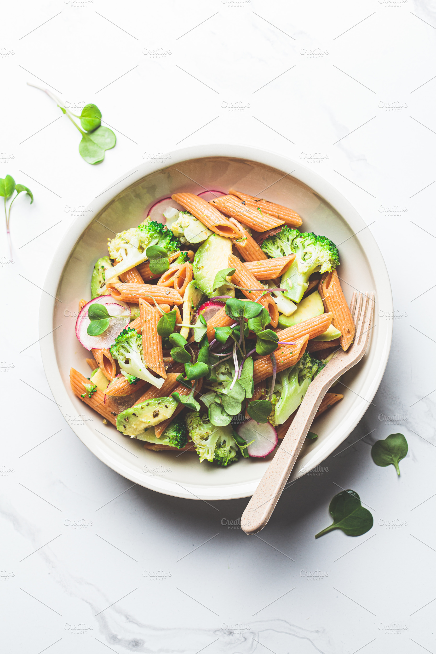 Lentil pasta with broccoli, avocado, a Food & Drink Photo by vaaseenaa