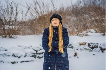The woman was very froze in winter, a Person Photo by Elizaveta Galitskaya
