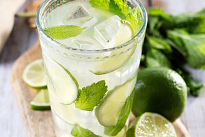Fresh mojito cocktail with lime, mint and ice in glass, a Food & Drink Photo by etorres69