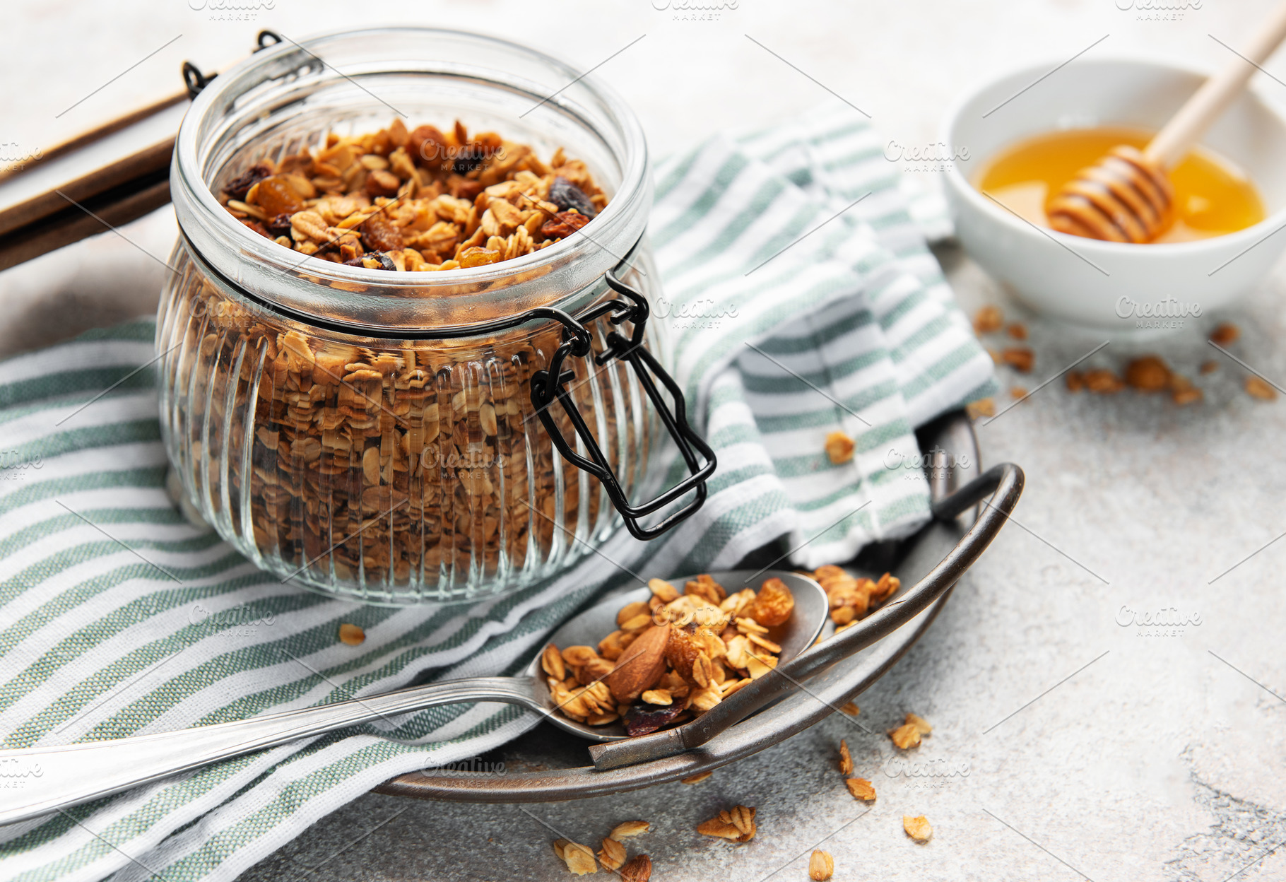 Homemade granola cereal with oats nuts and dried fruits, a Food & Drink Photo by Olena Rudo