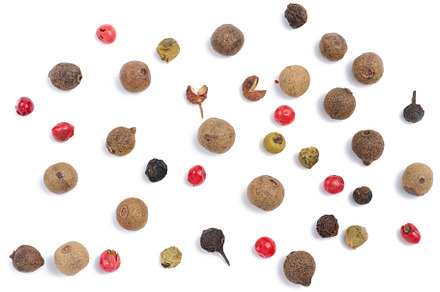 Aromatic pepper, black and red pepper on a white isolated backgr, a Food & Drink Photo by ndanko
