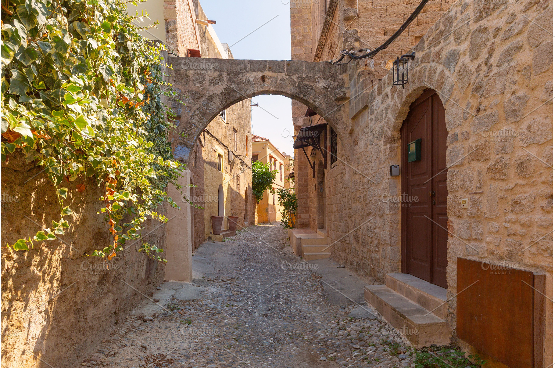 Stone street in old town of Rhodes, an Architecture Photo by kavalenkava