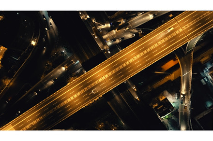 Top down of traffic road lit by, an Architecture Photo by Goinyk