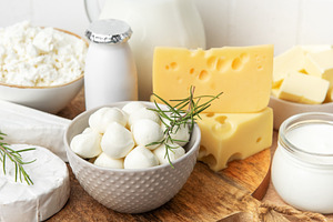 Dairy products assortment including cheese, milk, yogurt, a Food & Drink Photo by Olena Rudo