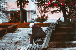Lonely senior silhouette on bench, a Person Photo by SkyNext