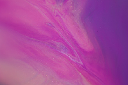 Shiny stream liquid texture neon ink particles art