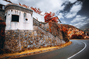 Wide abandoned roadside facade, a Transportation Photo by SkyNext