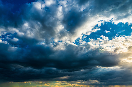 Sunbeams breaking through dramatic cumulus clouds. Change of wea, a Nature Photo by Eugene_Photo