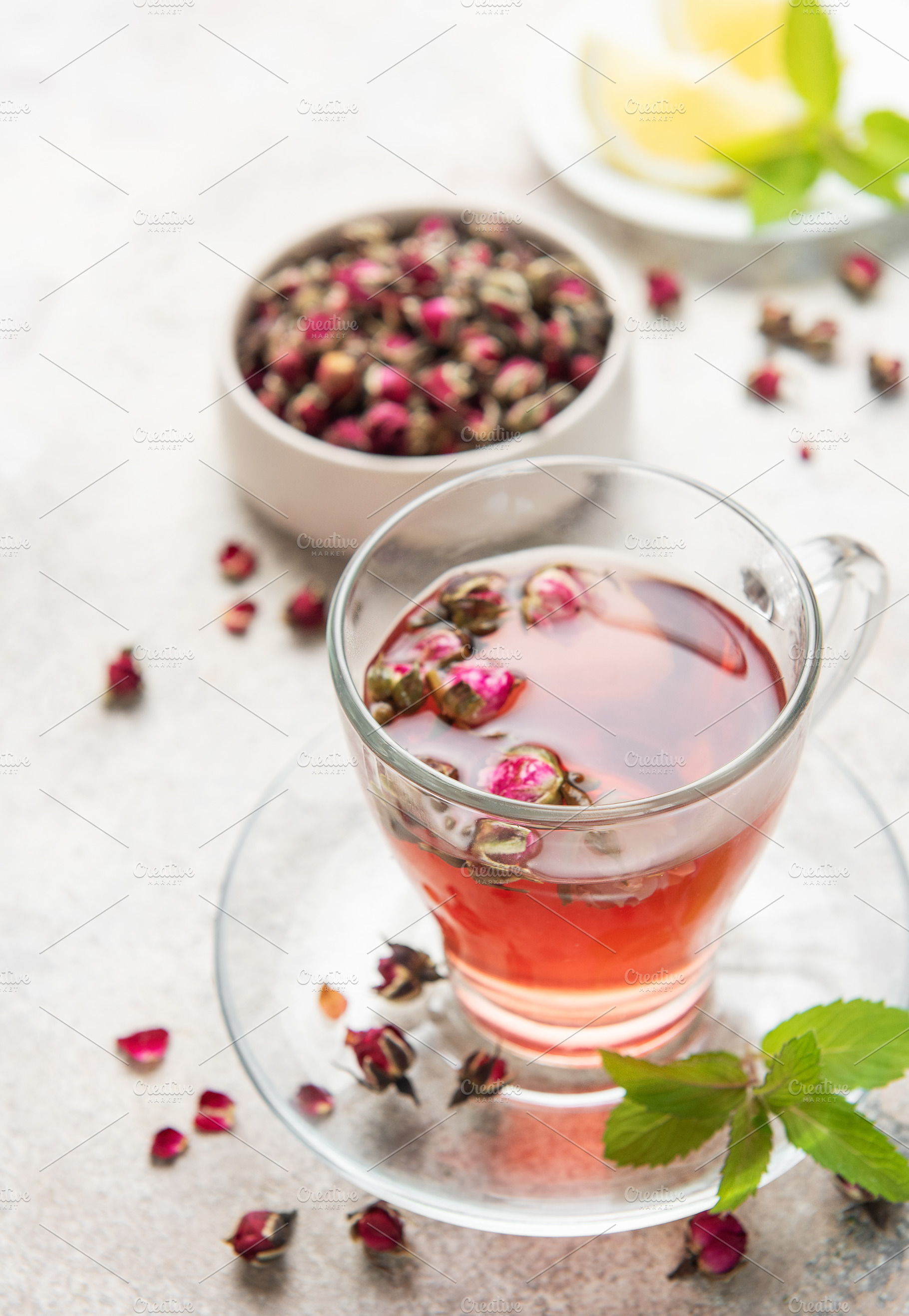 Pink rose herbal tea with dried buds and mint, a Food & Drink Photo by Olena Rudo