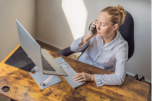Woman working in her home office, a Technology Photo by Elizaveta Galitskaya